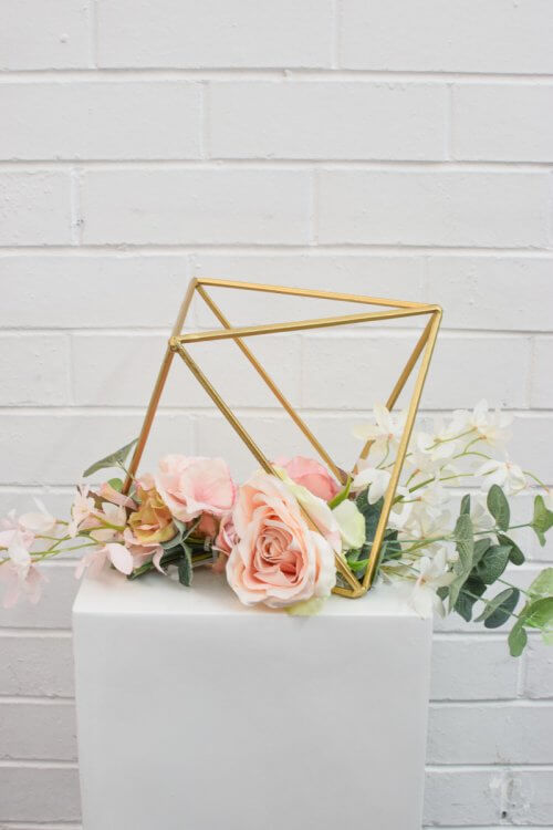 gold centrepiece with flowers