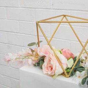 gold centrepiece with flowers