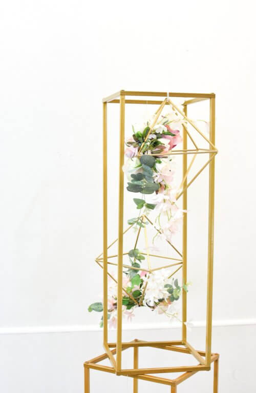Gold Box Frame Centrepiece with hanging gold geometrics